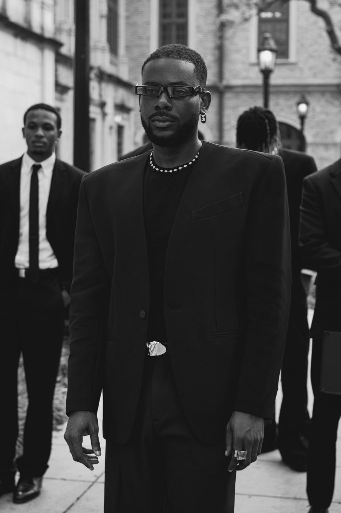 Adekunle Gold in white and black for ‘Coco Money’